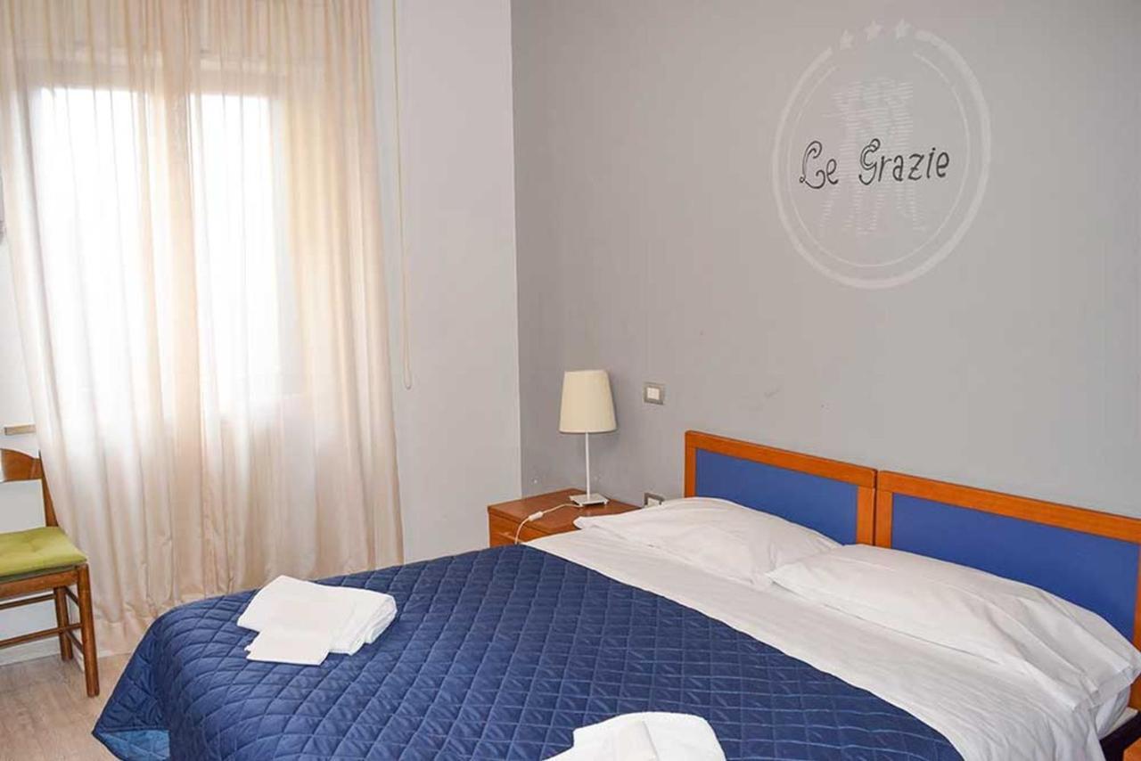 Le Grazie Hotel Asís Exterior foto